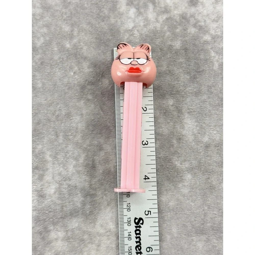 Vintage Pez Dispenser Arlene, 4 inches in height, manufactured in Slovenia.